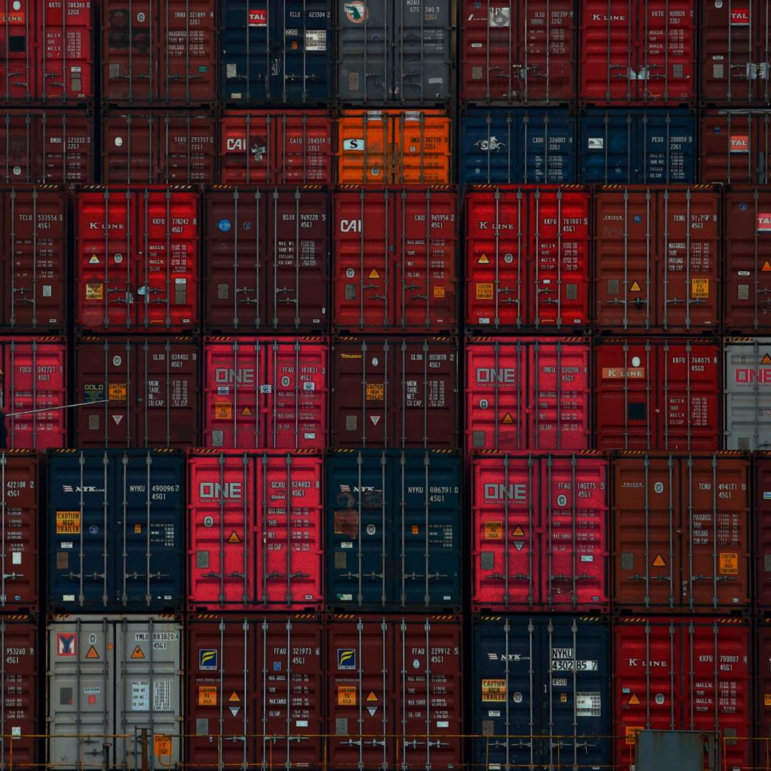 Shipping containers stacked on top of each other.