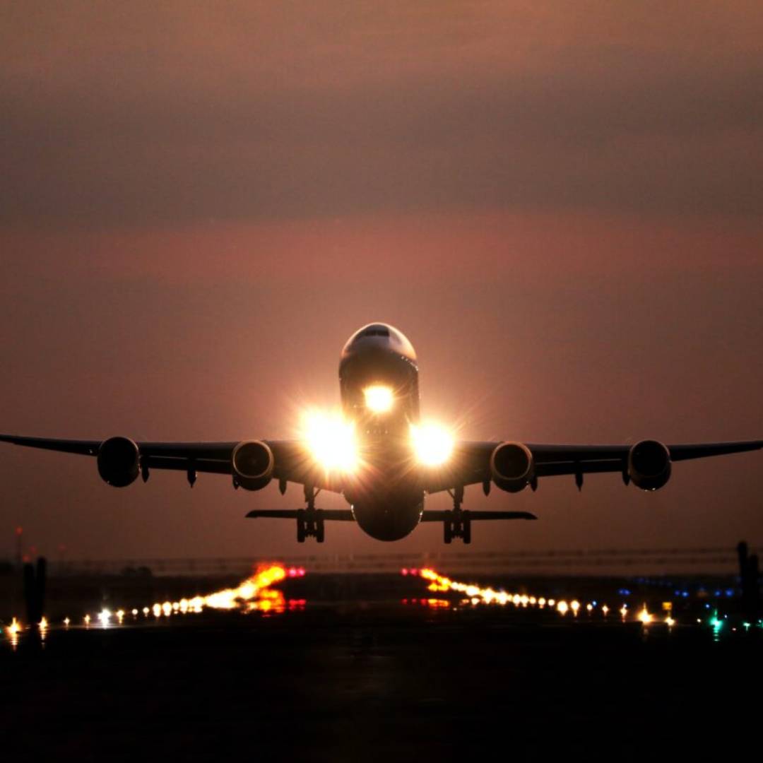 A plane landing at night
